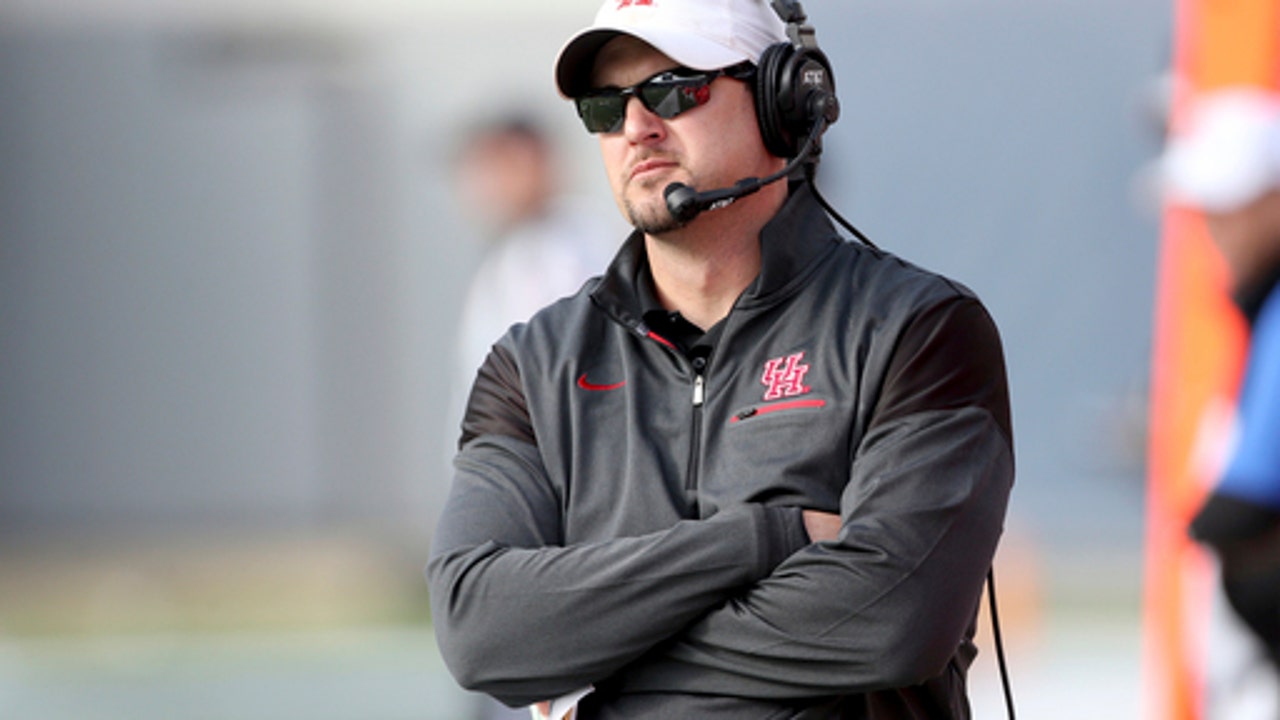 Amid Herman rumors, No. 18 Houston loses to Memphis 48-44